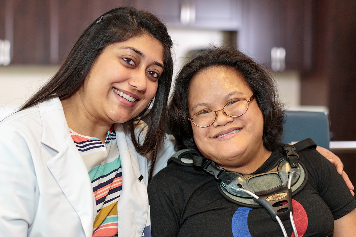 happy Therapist and a resident in the Rehab Gym at East Bay Post Acute