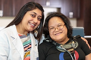 happy Therapist and a resident in the Rehab Gym at East Bay Post Acute