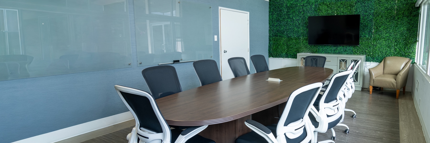 east bay post acute conference room with long table surrounded by office chairs