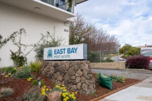 east bay post acute exterior of building with east bay sign