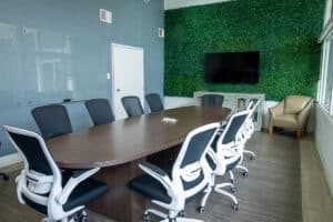 east bay post acute conference room with long table surrounded by office chairs
